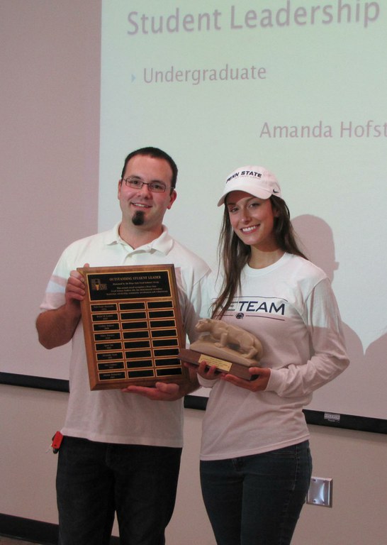 Andy Hirneisen, president, Food Industry Group, presents Amanda Hofstaedter with the Undergraduate Student Leadership Award